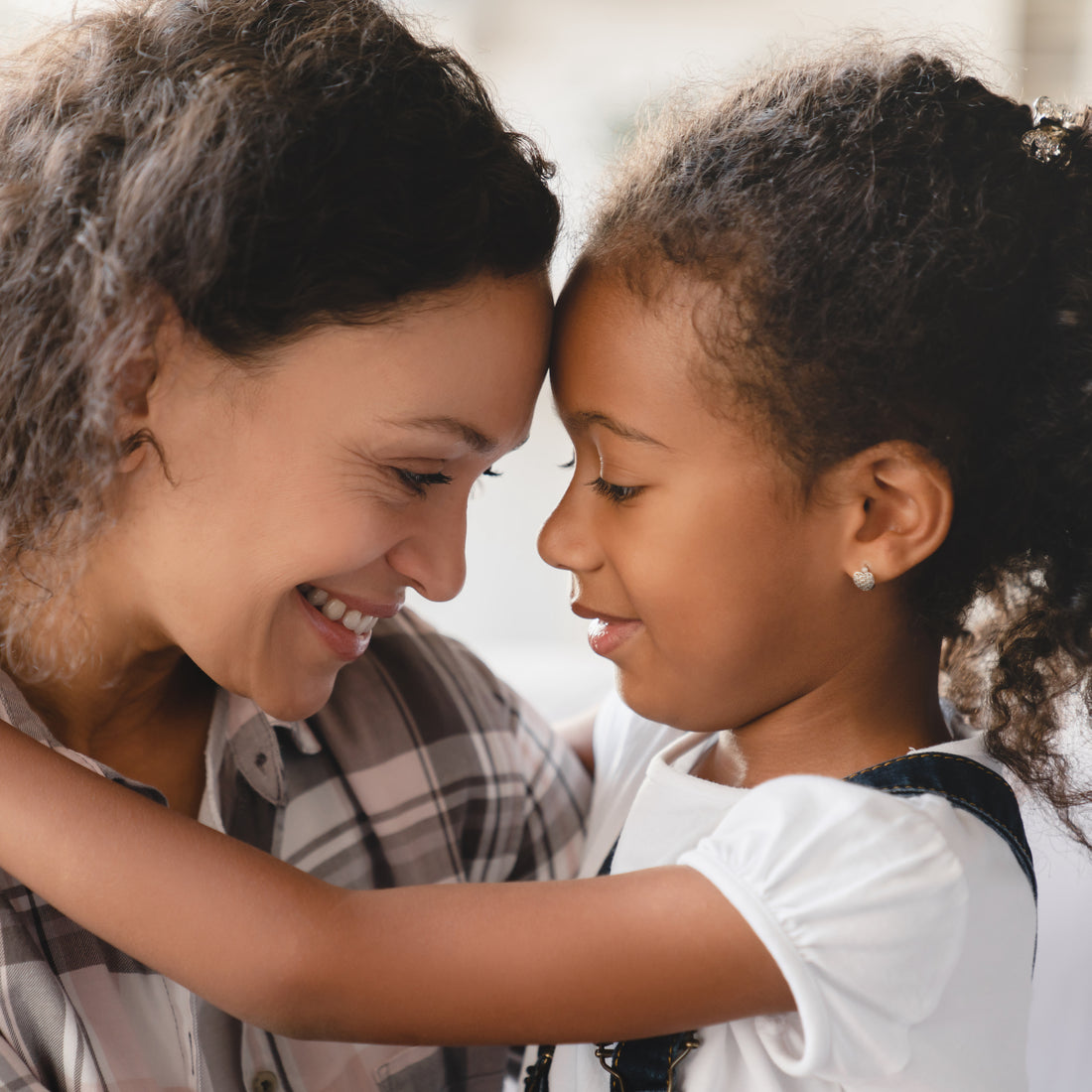 mother and daughter hugging - San Rocco Italia