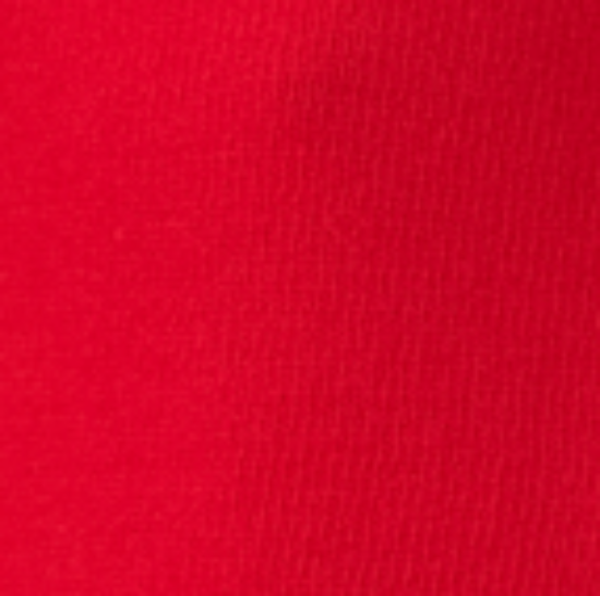 Close up of vibrant red knit fabric texture from a cashmere blend dress