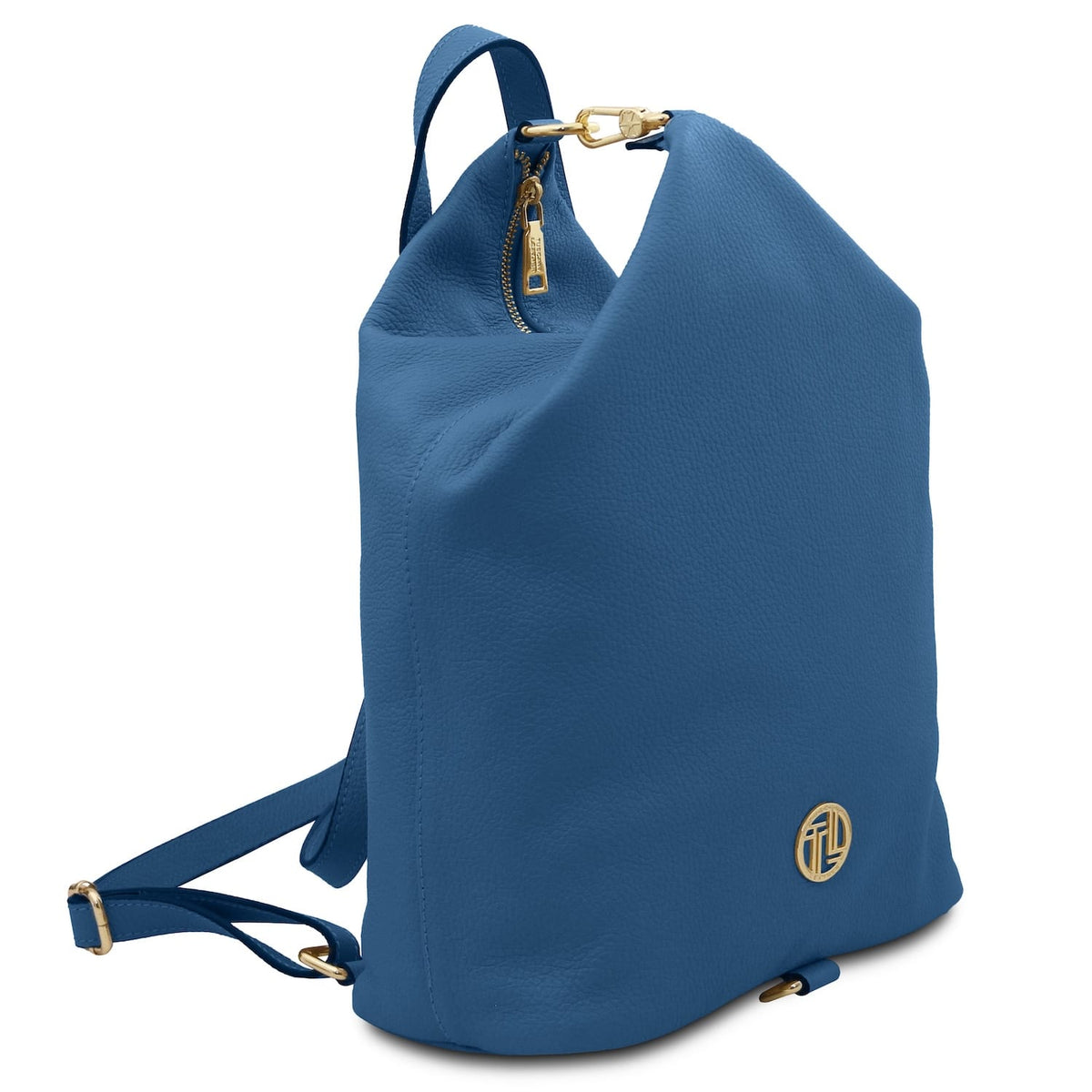 Blue Dublin leather backpack shown from a three quarter angle with gold hardware and adjustable strap
