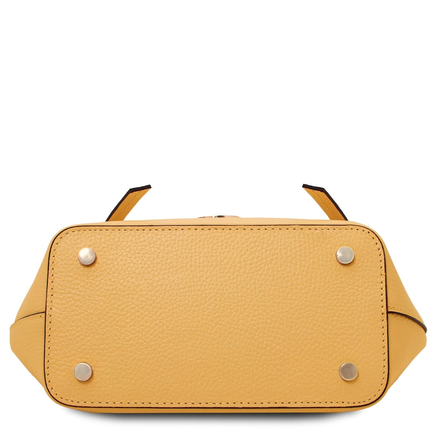 Bottom view of Legame small yellow leather handbag with four metal studs.