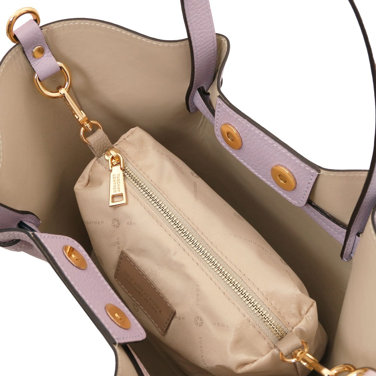 Interior of Legame small lavender leather handbag with beige lining and zip pouch.