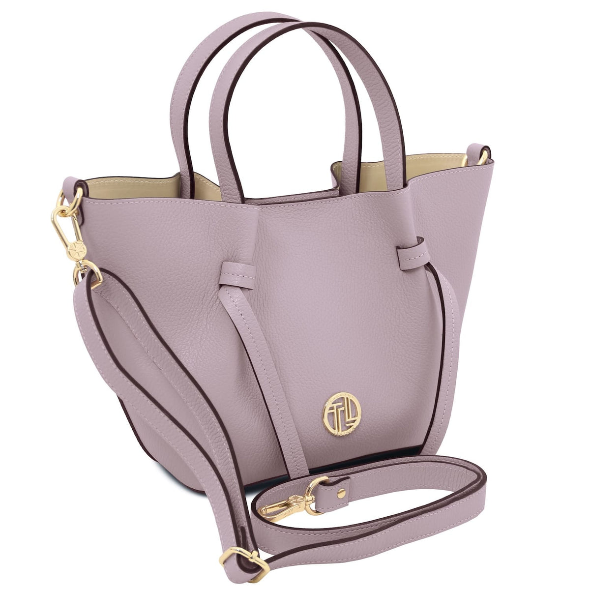 Legame small lavender leather handbag with two top handles and a gold logo emblem.