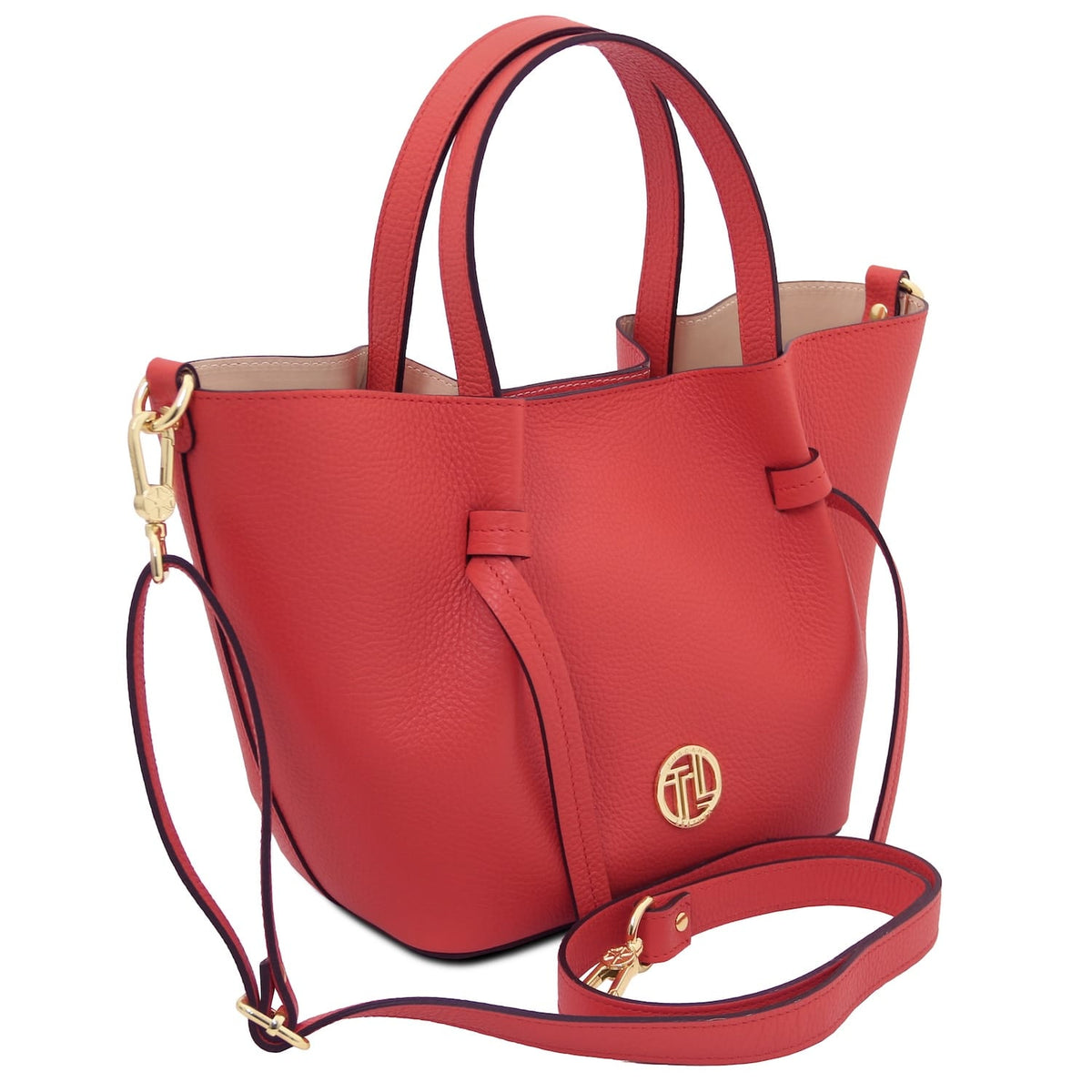 Red leather handbag with two top handles and a detachable shoulder strap featuring gold hardware.