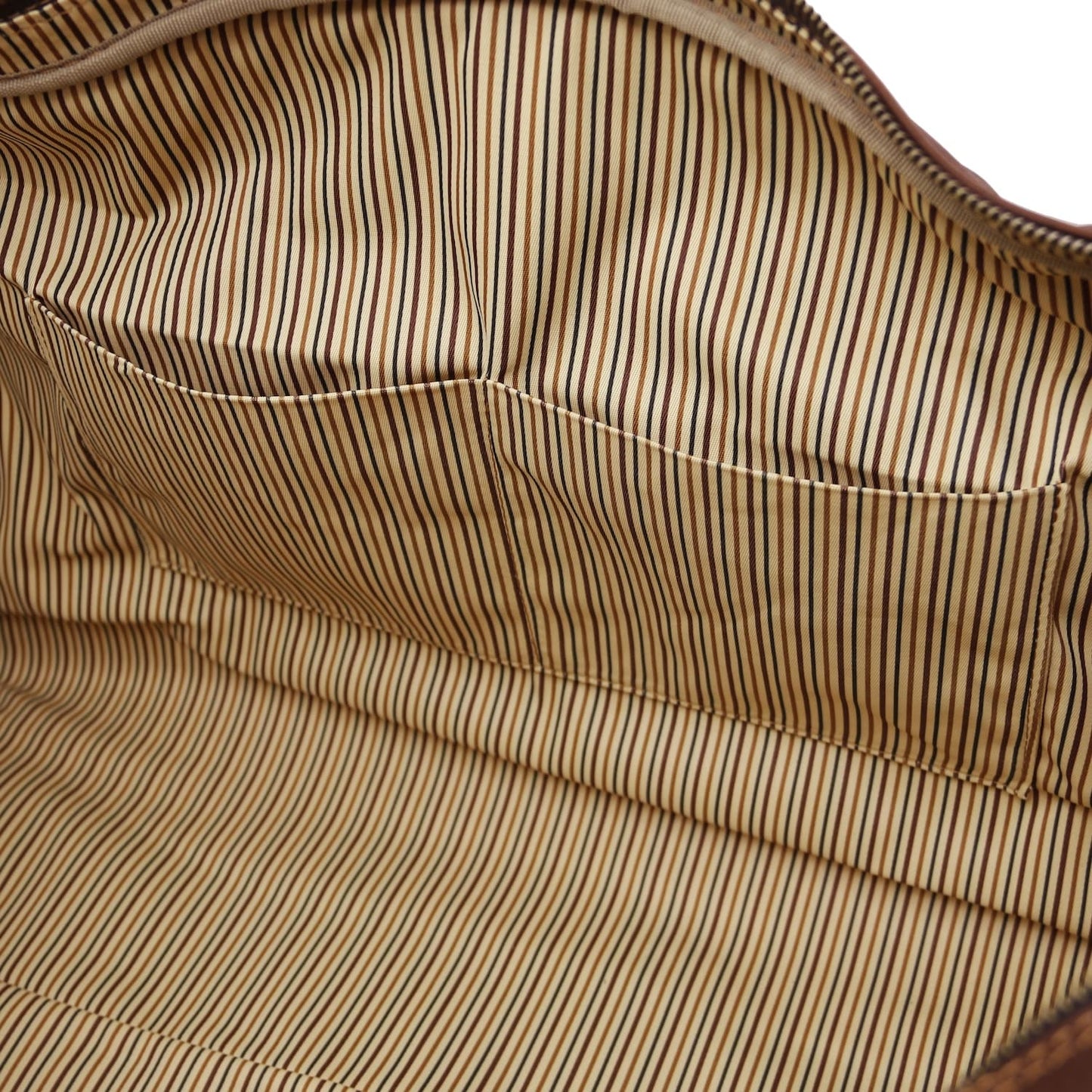 Inside view highlighting a stitched pocket and striped lining.