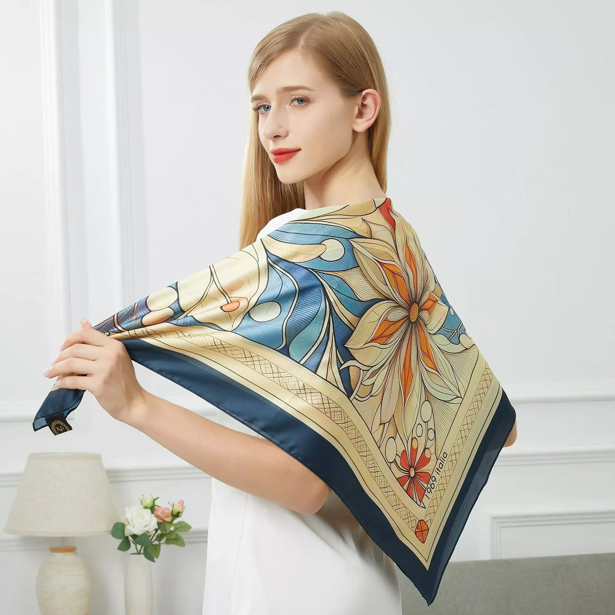 Mystic Flowers Large Square Silk Schal (90 × 90 cm) featuring intricate floral and leaf patterns in blue, orange, and cream tones.