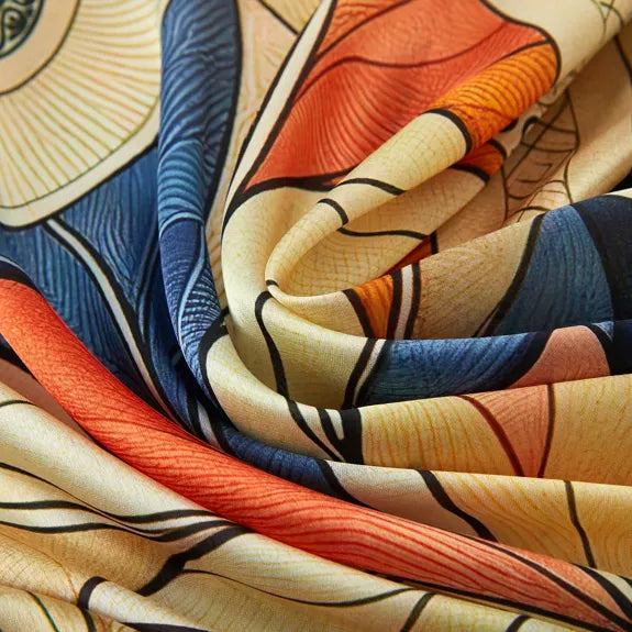 Mystic Flowers Large Square Silk Schal (90 × 90 cm) featuring vibrant floral and abstract patterns in warm orange, blue, and cream tones.