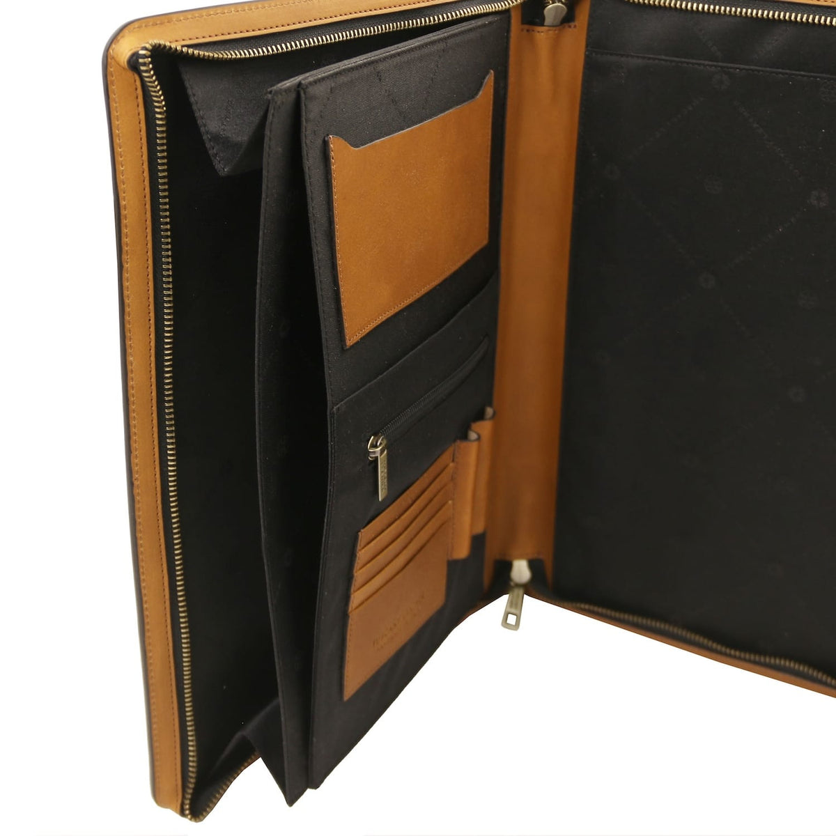 Open Tiberio leather document case with tan trim and black interior showing card slots and a zip pocket
