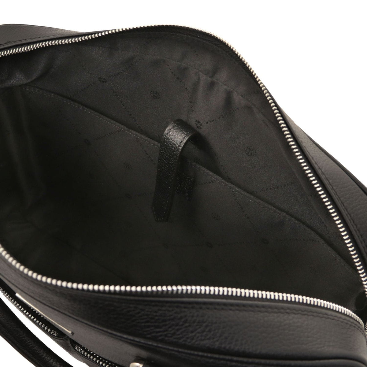 Interior of Treviso serviette pour ordinateur en cuir with blue lining, poche zippée along the top, and a leather sangle de maintien.