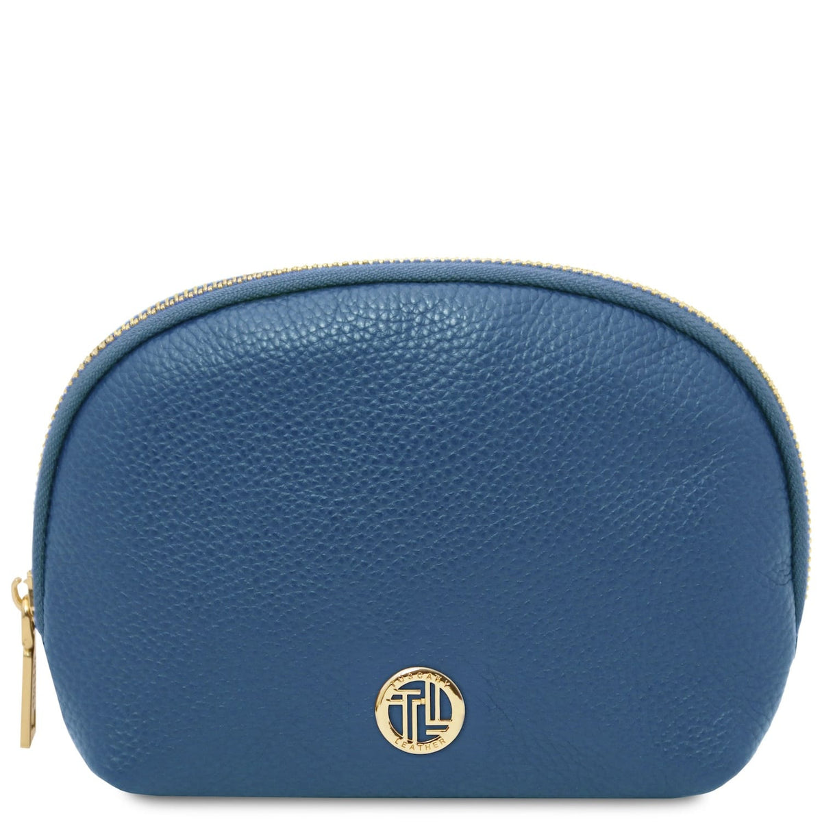 Compact blue cuir grainé toiletry case with gold-tone zipper and circular metal emblem on front panel.