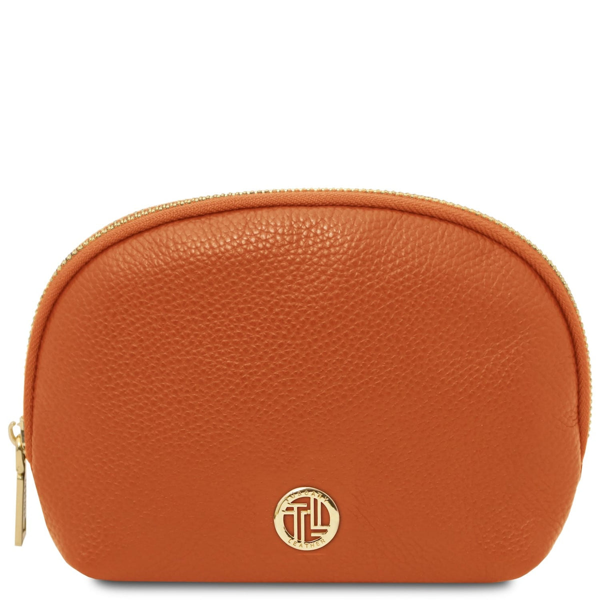 Compact cuir souple toiletry case in warm cognac with texture grainée and gold-tone zipper pull and emblem.
