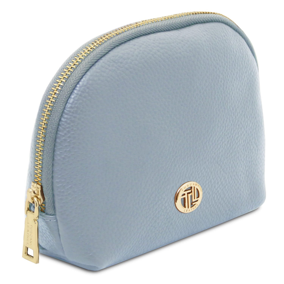 Trousse de toilette en cuir bleu souple avec zip doré et emblème métallique rond sur le devant