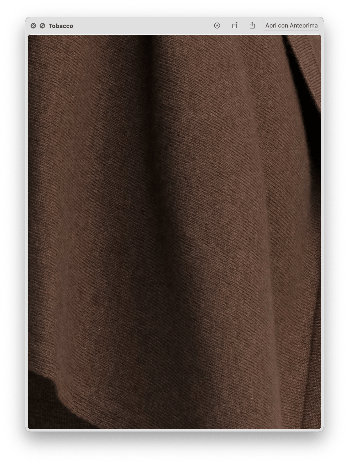 Close-up of smooth tobacco brown fabric texture showing fine knit fibers of the Wool & Cashmere Mix Maxi V-Neck Sweater.