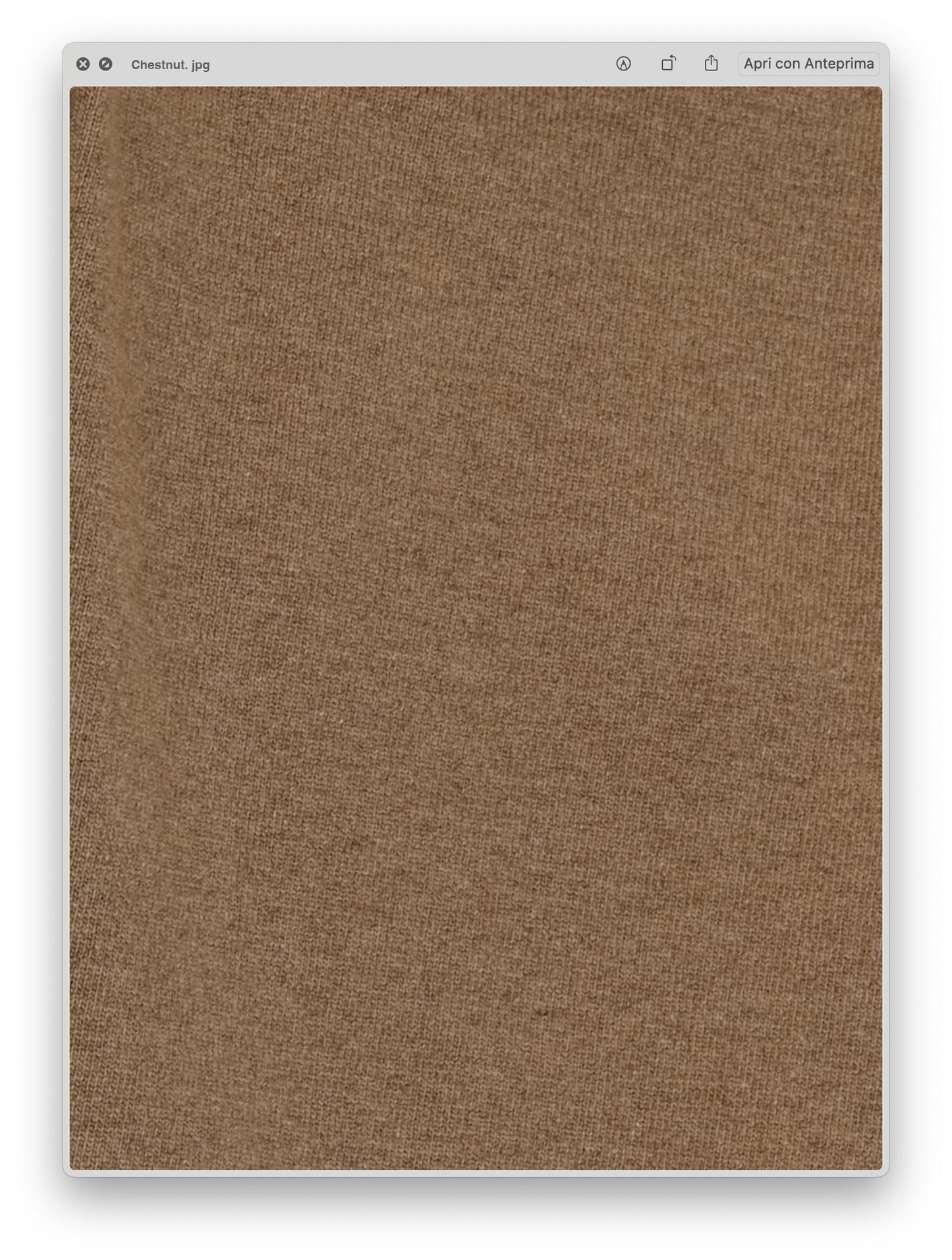 Close-up of soft chestnut brown fabric texture showing the fine knit detail of the Wool & Cashmere Mix Sleeveless Cable Knit Dress.