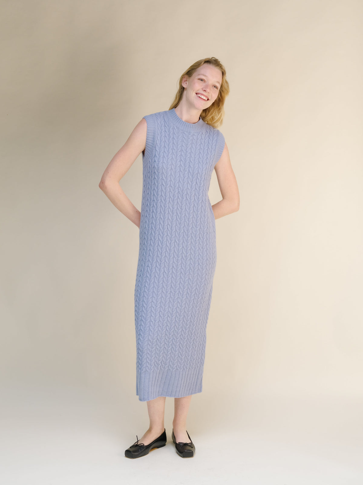 Wool & Cashmere Mix Sleeveless Cable Knit Dress in soft blue featuring a detailed cable pattern and a midi length silhouette.