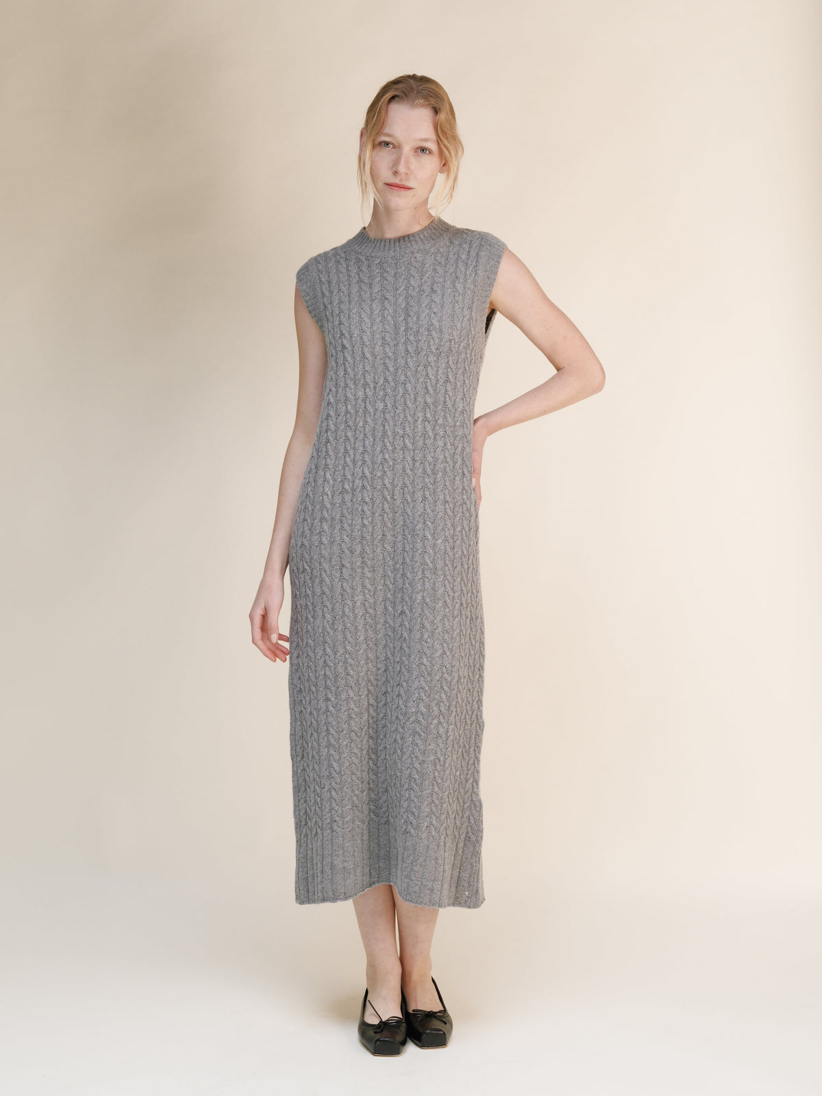Wool & Cashmere Mix Sleeveless Cable Knit Dress in grey with a fitted midi silhouette and textured cable knit detailing.