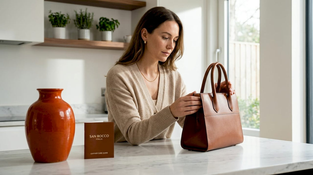 Woman inspecting Italian leather handbag at table