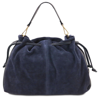 A navy blue suede drawstring bag with a single shoulder strap and gold-tone hardware, shown against a plain white background.