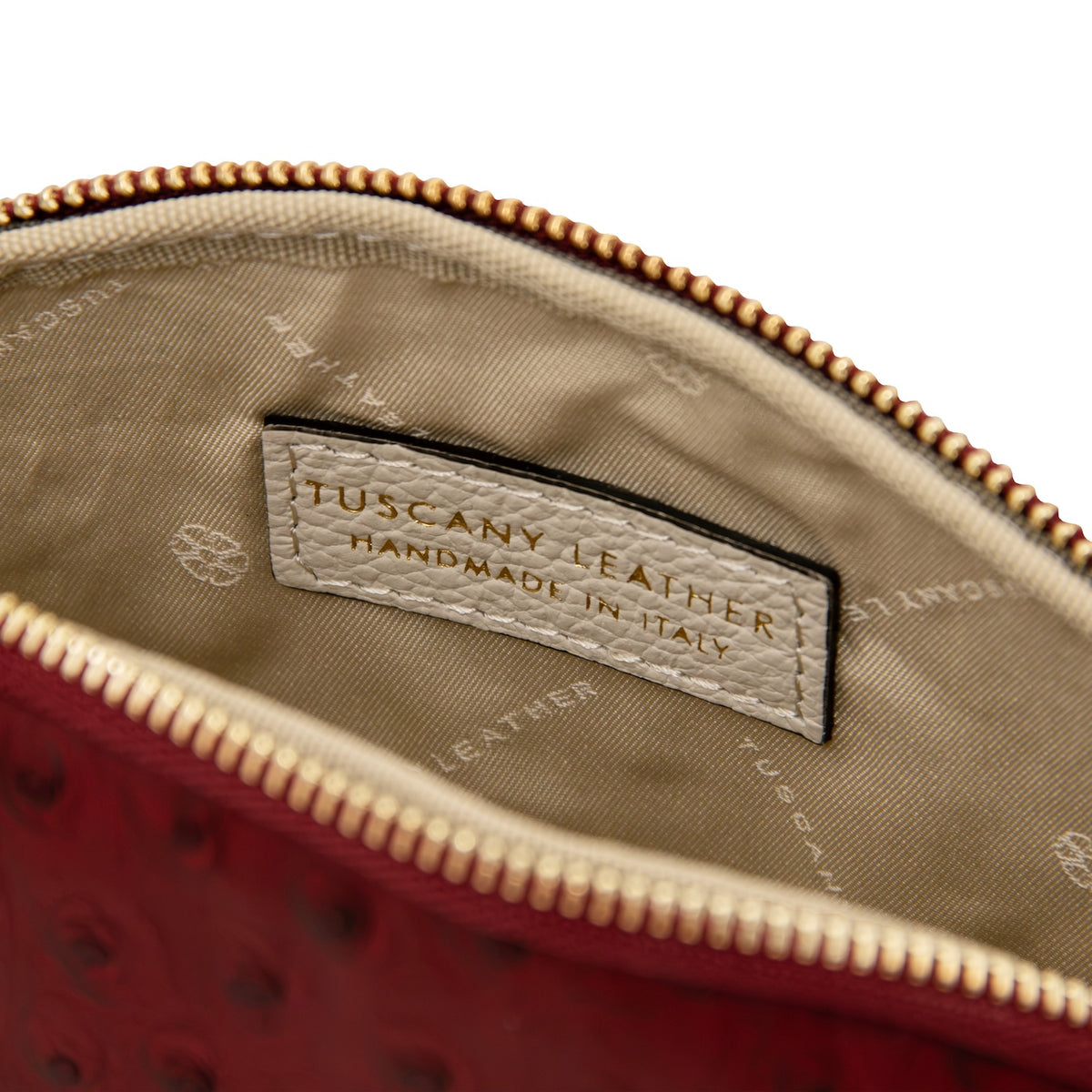 Vera - Leather toiletry case in ostrich-print leather