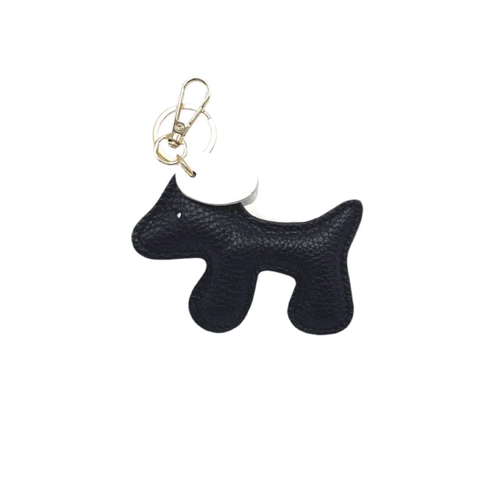 Black dog-shaped keychain on a white background