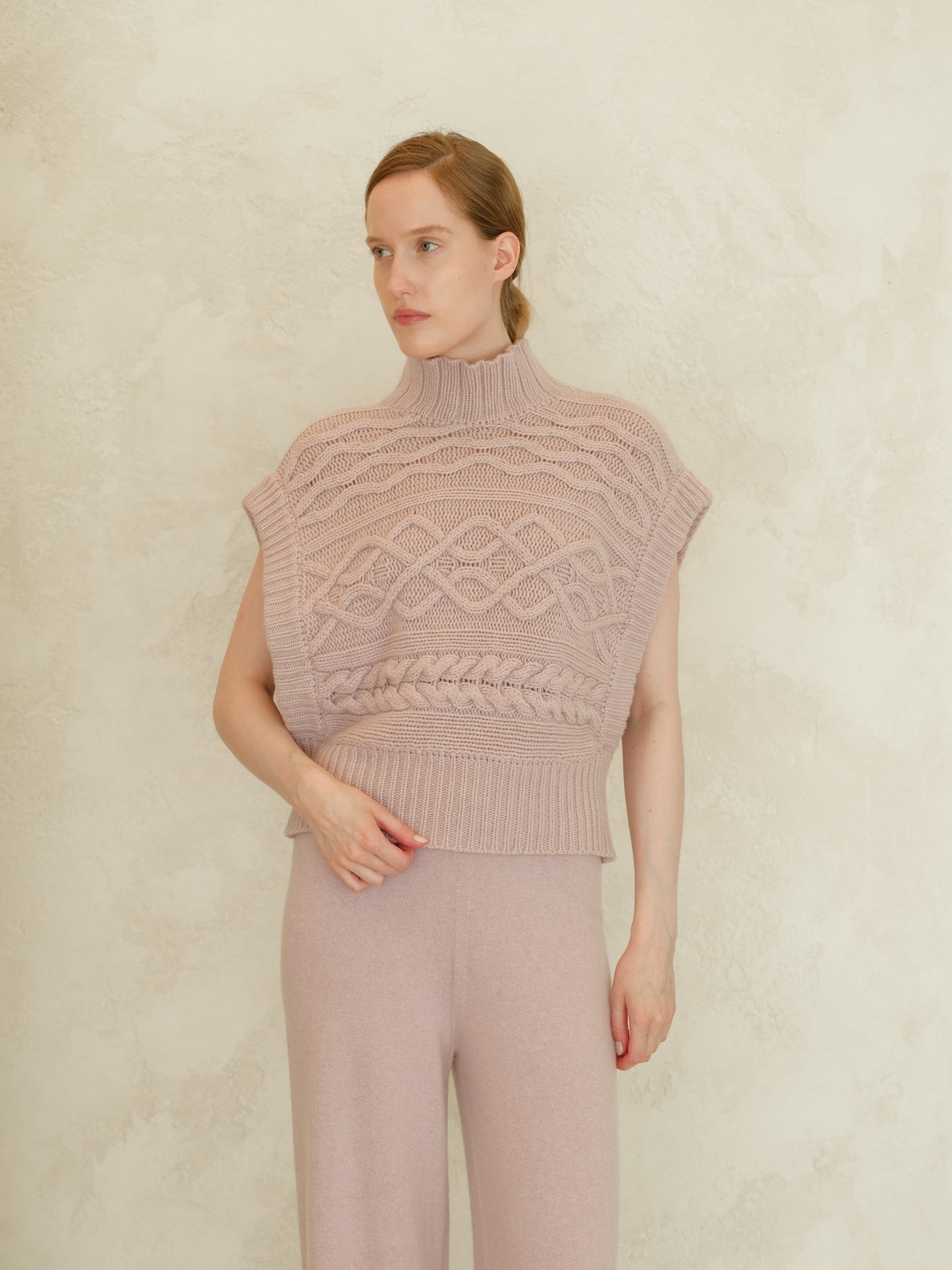 Soft pink cashmere mix maxi cable tunic with a high ribbed neck and chunky front cable pattern
