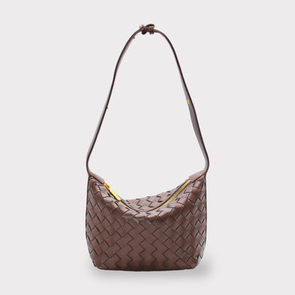 Genuine leather woven brown shoulder bag with a gold zipper closure.