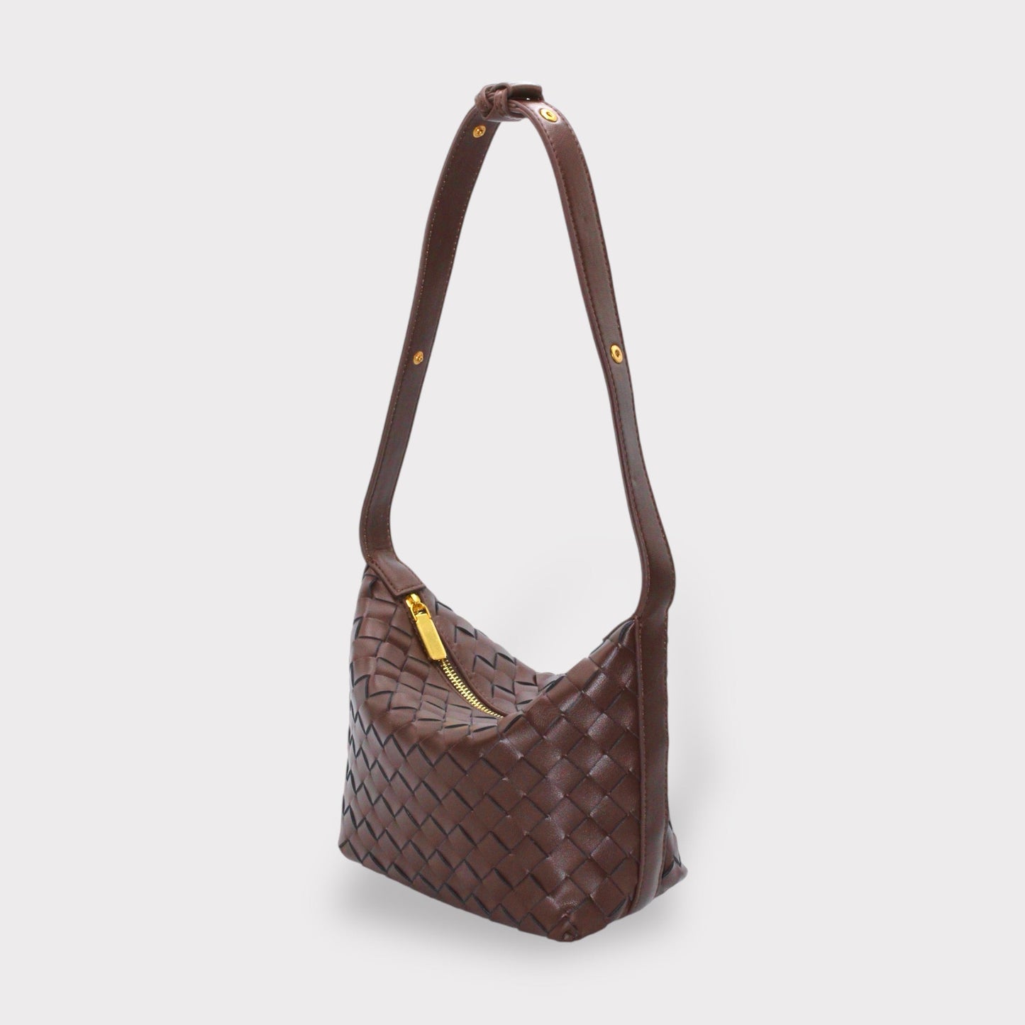 Genuine leather woven boxed pouch bag in chocolate brown with an adjustable shoulder strap.