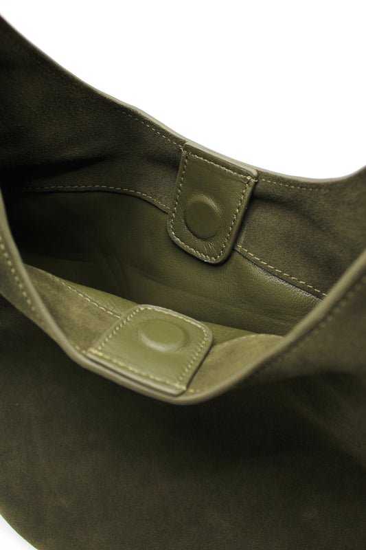 Close up of Elsa boat tote interior showing olive lining and snap closure.