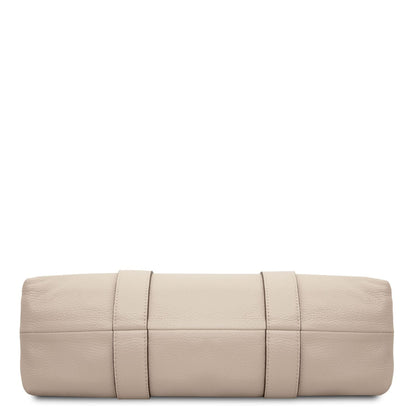 Bottom view of Callie soft leather shoulder bag in beige showing textured leather and stitched straps