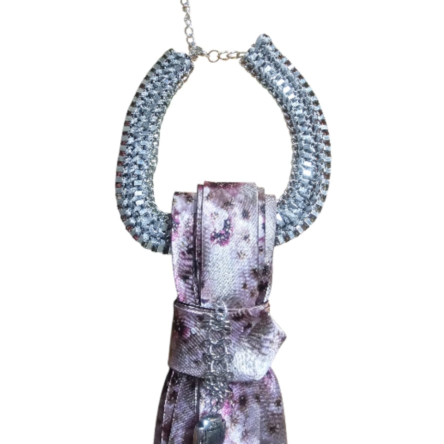 Chunky silver chain necklace draped around a floral purple 4-in-1 Jeweled Tie.
