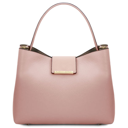 Pink pebbled leather bucket bag with single top handle and gold front plaque