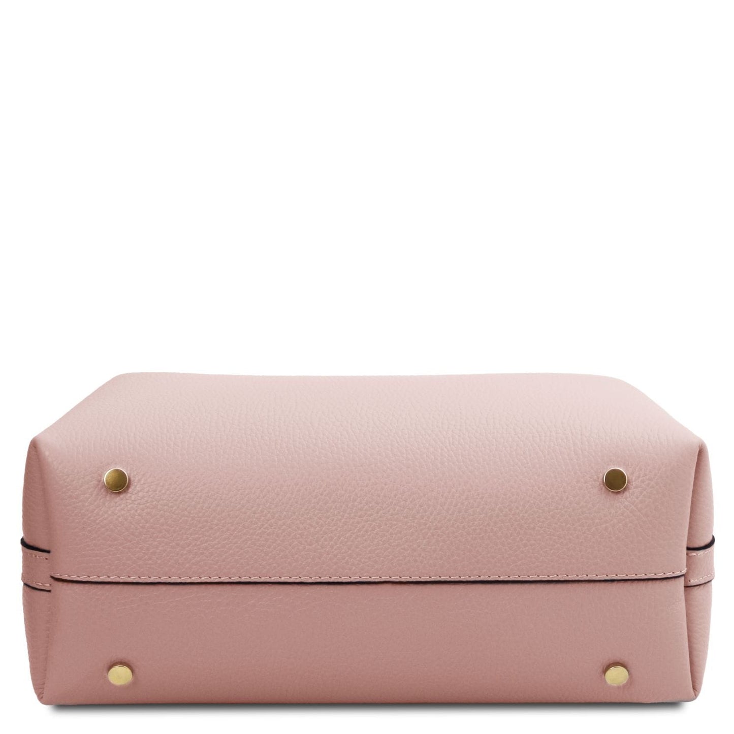 Bottom view of soft pink pebbled leather bucket bag with gold feet.