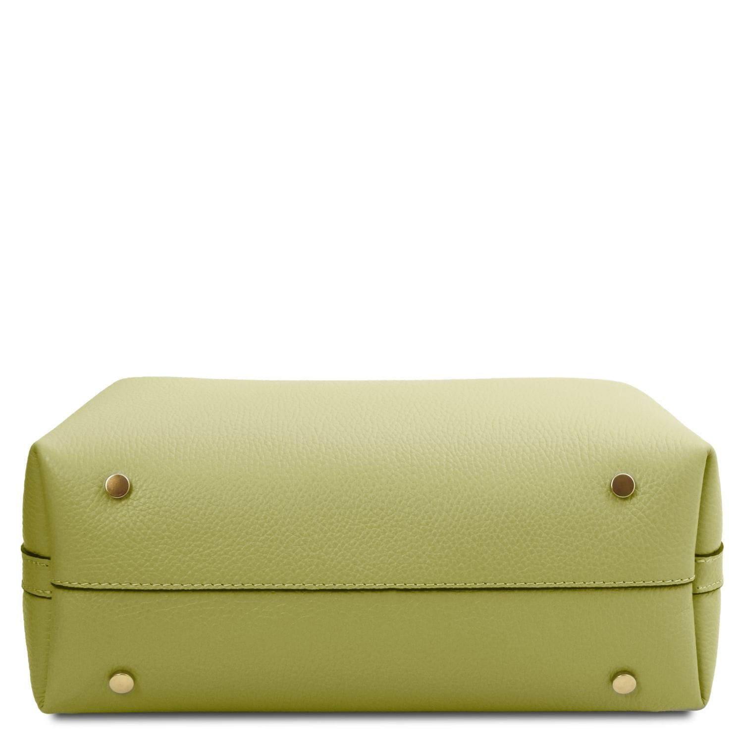 Lime green pebbled leather bucket bag bottom with four gold stud feet