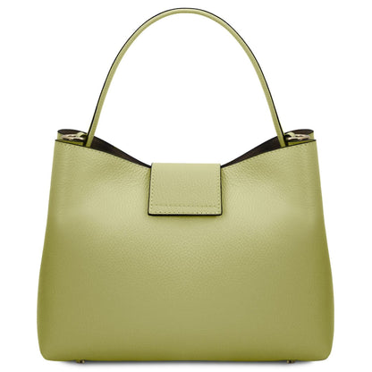 Front three quarter view of lime pebble leather bucket bag with top handle and front flap