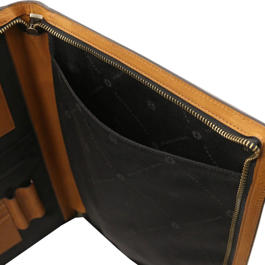 Interior view of leather document case with top zipper and multiple organization pockets
