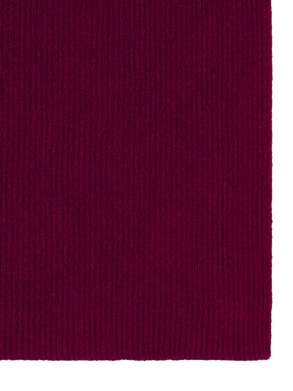 Close-up of deep magenta ribbed knit fabric texture