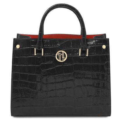 Croque - Croc print leather tote handbag | TL142504 in black glossy embossed leather with goldfarbene Beschläge and Tragegriffs vor weissem Hintergrund