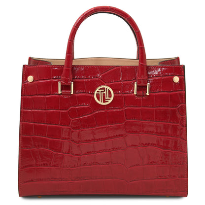 Croque - Croc print leather tote handbag | TL142504 in glossy red with structured silhouette, zwei Tragegriffe, and goldfarbene Beschläge vor weissem Hintergrund.