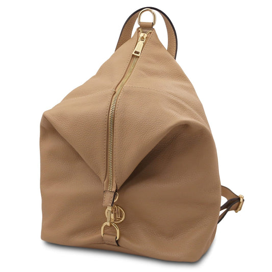 Dublin soft Italian leather backpack in tan with a vertical gold zipper and top loop handle.