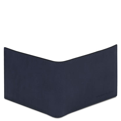 Navy matte leather wallet shown from the side with a curved top edge and Tuscany Leather stamp