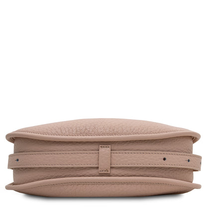 Blush pink Hoblò soft leather hobo bag laid flat showing rounded bottom and pebbled texture