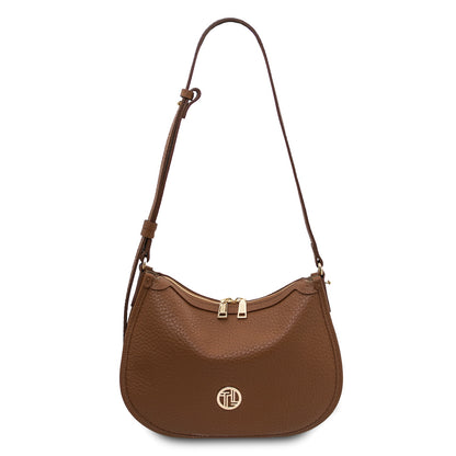 Front view of brown Hoblò Soft Leather hobo bag with long strap, gold hardware, and circular logo emblem.