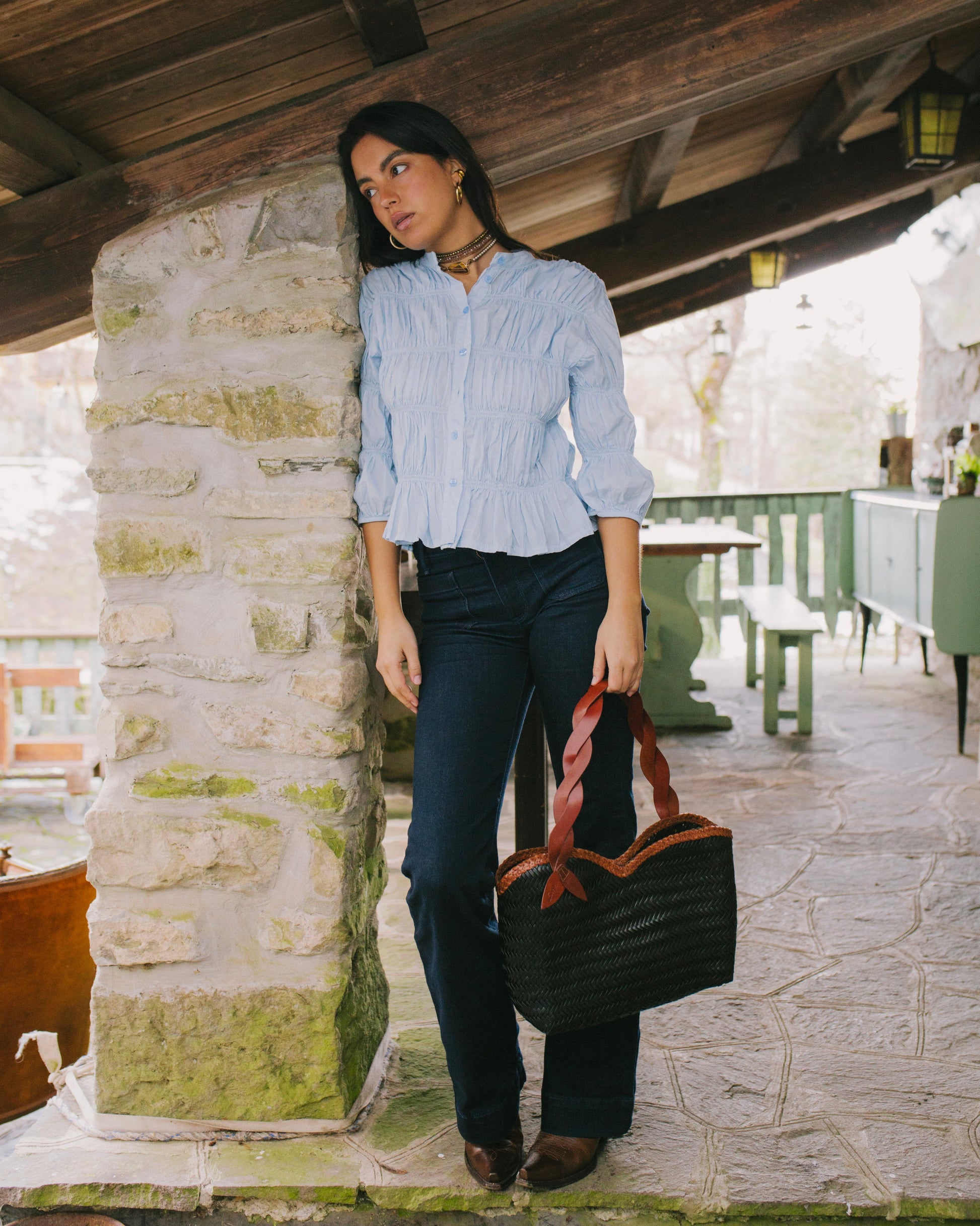 Léafa - Handwoven Leather Shoulder Bag | Brown & Black shown with twisted brown leather handles and woven black leather body.
