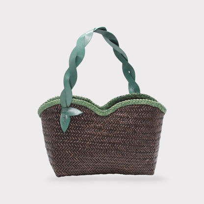 Léafa - Handwoven Leather Shoulder Bag | Green & Coffee featuring a woven dark brown body with scalloped green trim and twisted green leather handles
