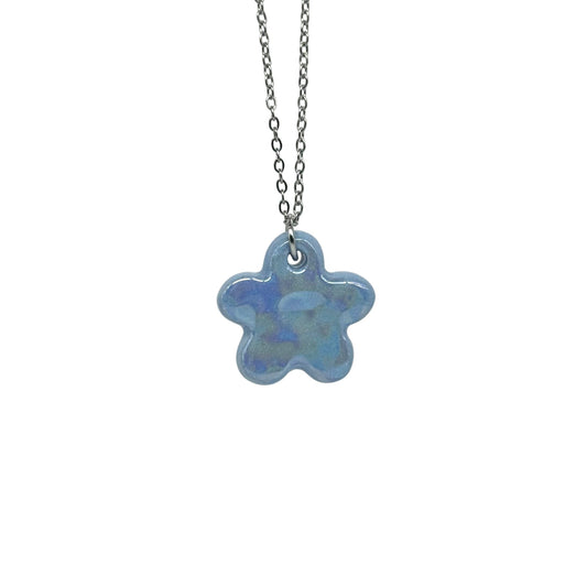 Lillium blue floral ceramic pendant on a silver chain