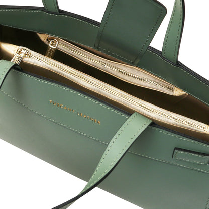 Green Musa Italian leather handbag with gold zippers and beige interior showing two zip compartments.