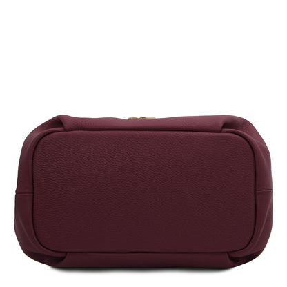 Nora - Soft leather handbag | TL142372 in burgundy pebbled leather with soft structured shape shown from the bottom on white background