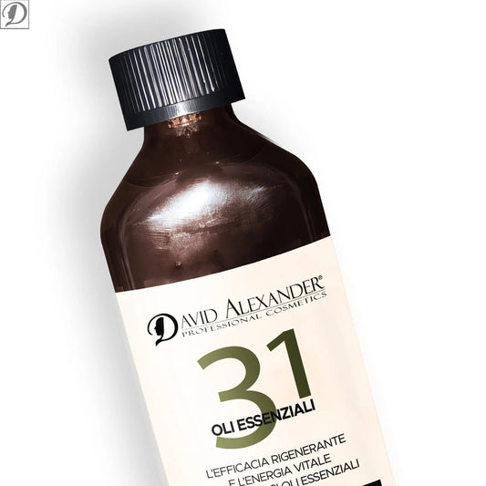 Dark amber Olio 31 essential oil bottle tilted with a black ribbed cap and pale label