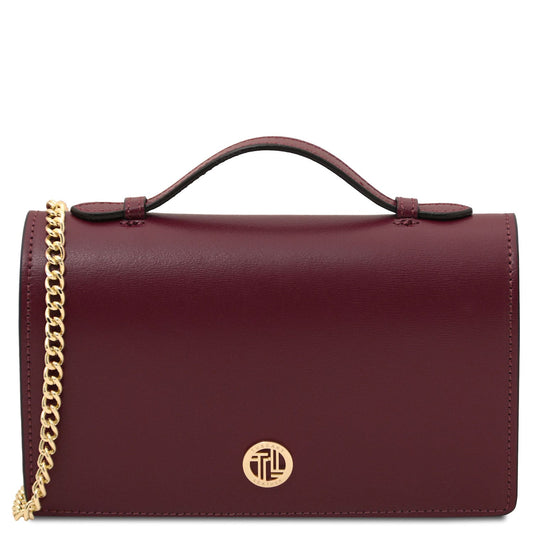Opera - Leather clutch with chain strap | TL142505 in burgundy smooth leather with gold-tone chain strap, top handle, and logo emblem on white background