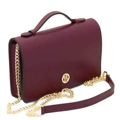Opera - Leather clutch with chain strap | TL142505 in smooth burgundy leather with gold-tone chain and top handle on white background