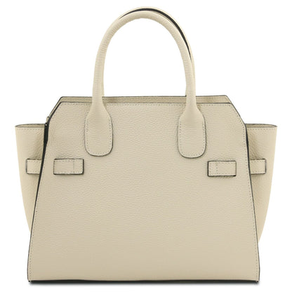 Beige textured leather tote with two top handles and subtle black edging